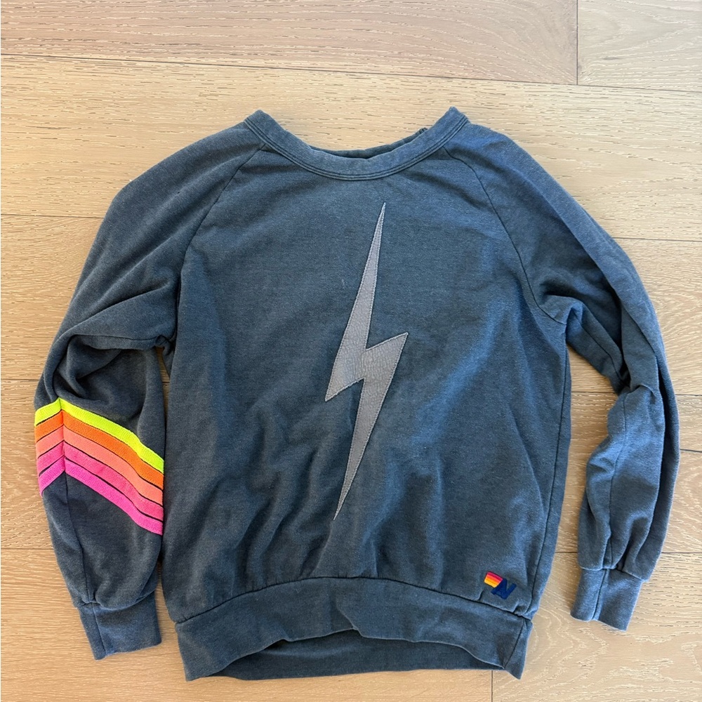 Aviator Nation blue/gray sweatshirt with yellow, pink, orange stripes